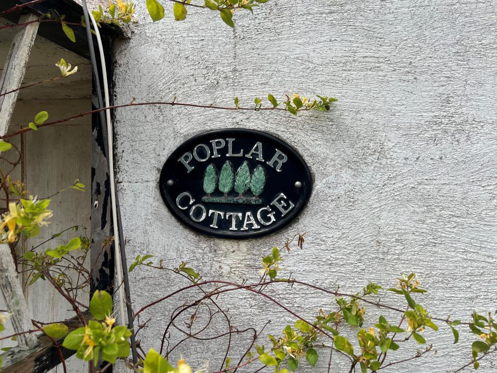 Lot: 128 - THREE-BEDROOM COTTAGE FOR IMPROVEMENT IN POPULAR VILLAGE LOCATION - Name Plaque